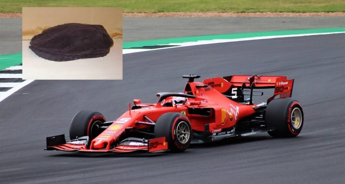 Scoperto il motivo della lentezza di Vettel: sotto il casco indossa un cappello - Lercio