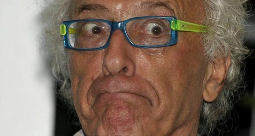 Mughini perde la testa e si veste normalmente - Lercio